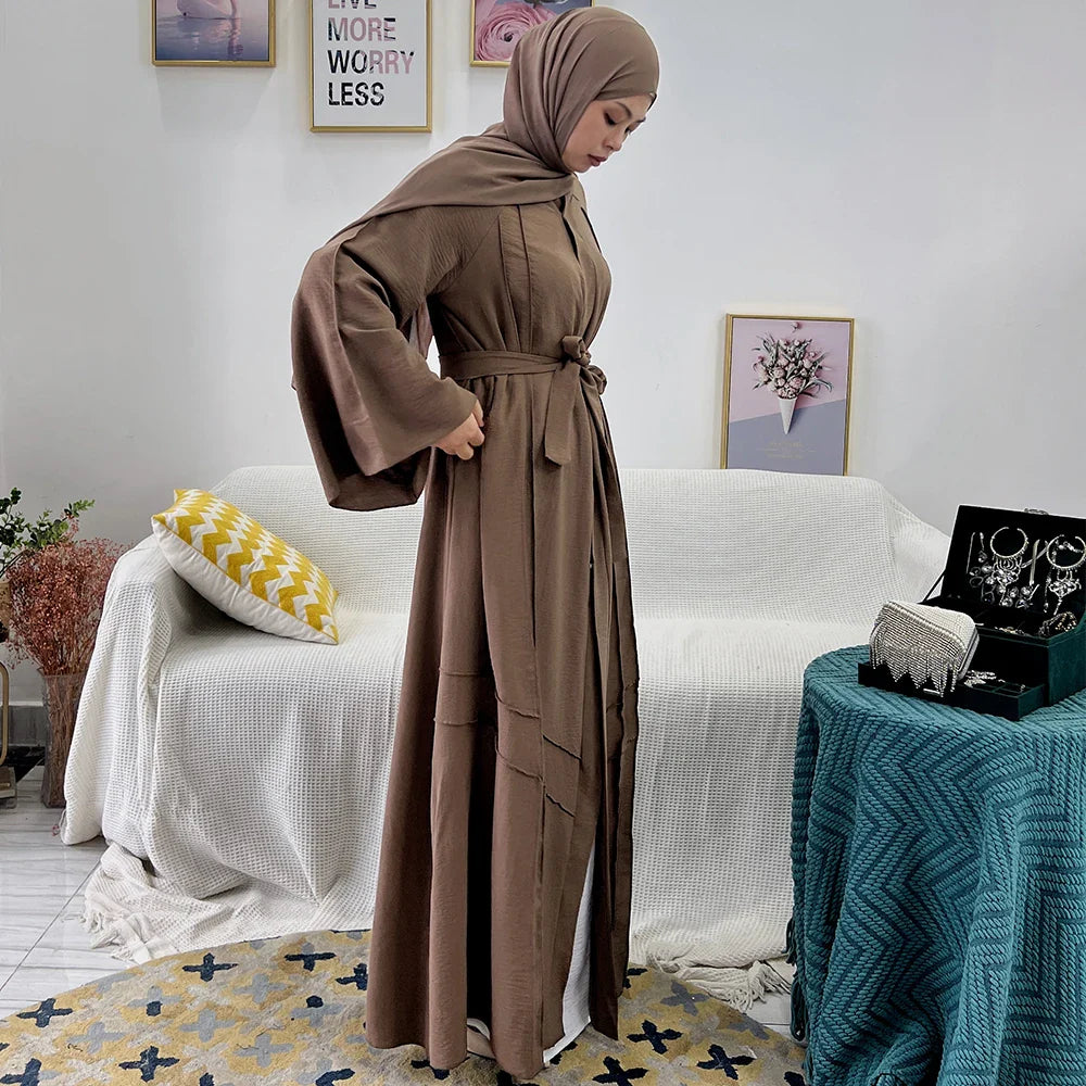 Loriya vente chaude conçoit des vêtements islamiques en polyester froissé noir abaya uni modeste abaya robe pour femmes musulmanes 