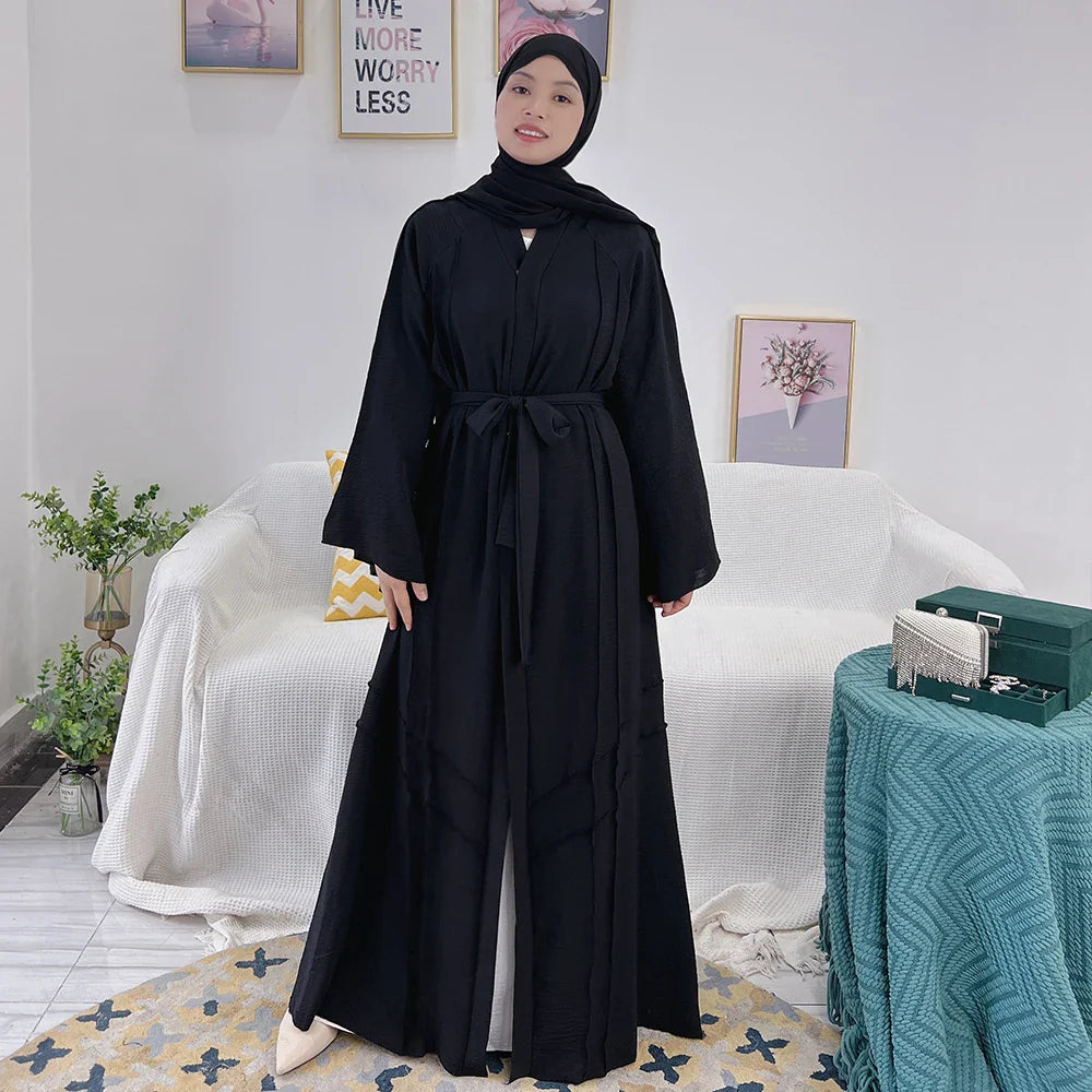 Loriya vente chaude conçoit des vêtements islamiques en polyester froissé noir abaya uni modeste abaya robe pour femmes musulmanes 