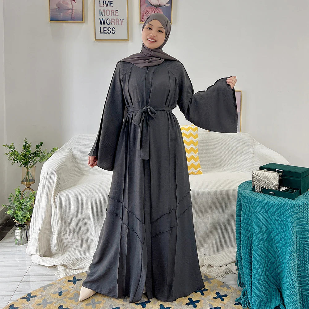 Loriya vente chaude conçoit des vêtements islamiques en polyester froissé noir abaya uni modeste abaya robe pour femmes musulmanes 