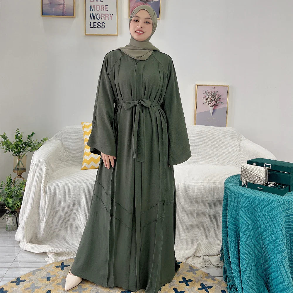 Loriya vente chaude conçoit des vêtements islamiques en polyester froissé noir abaya uni modeste abaya robe pour femmes musulmanes 